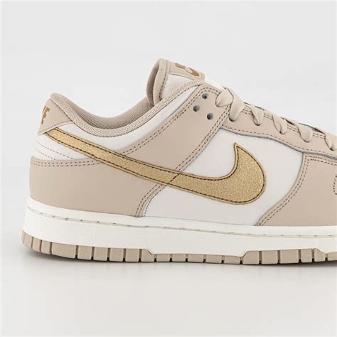 nike dunk low gold rose